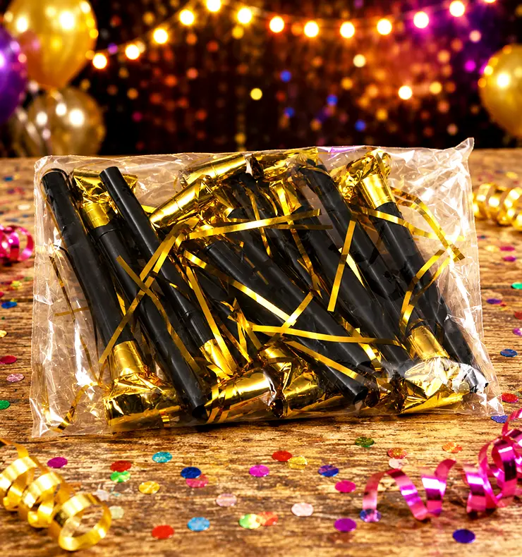 Schwarz-goldene Partytröten im Beutel
